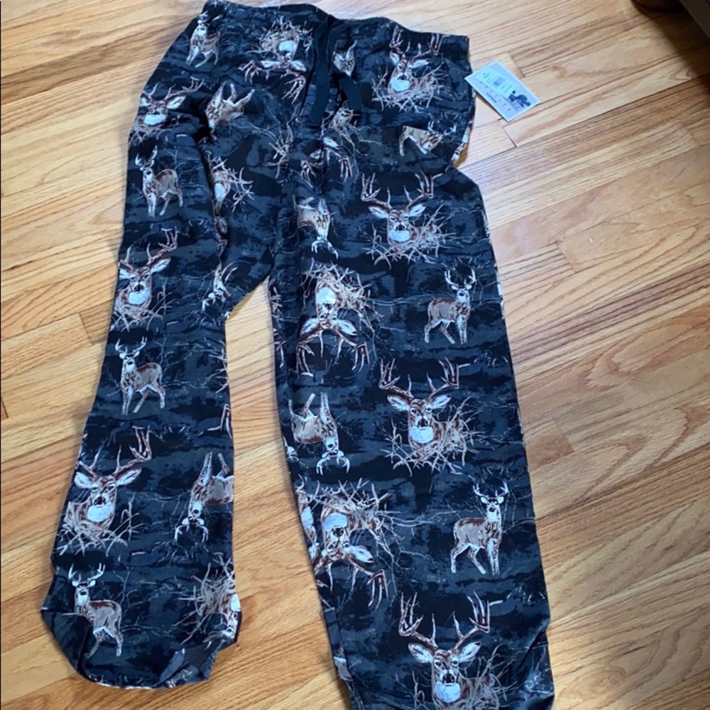 Pajama pants with deer print on them